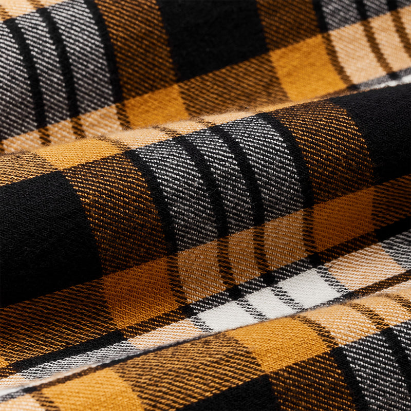 The rangeland flannel shirt di Filson | Yellow / faded black plaid (Orange)