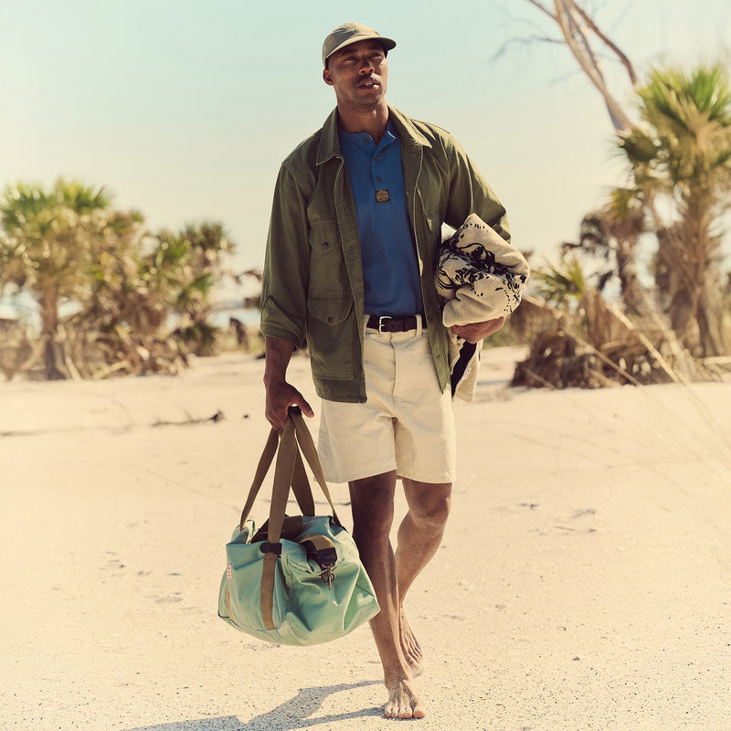 Tin cloth medium duffle bag par Filson | Granite green (Blue)