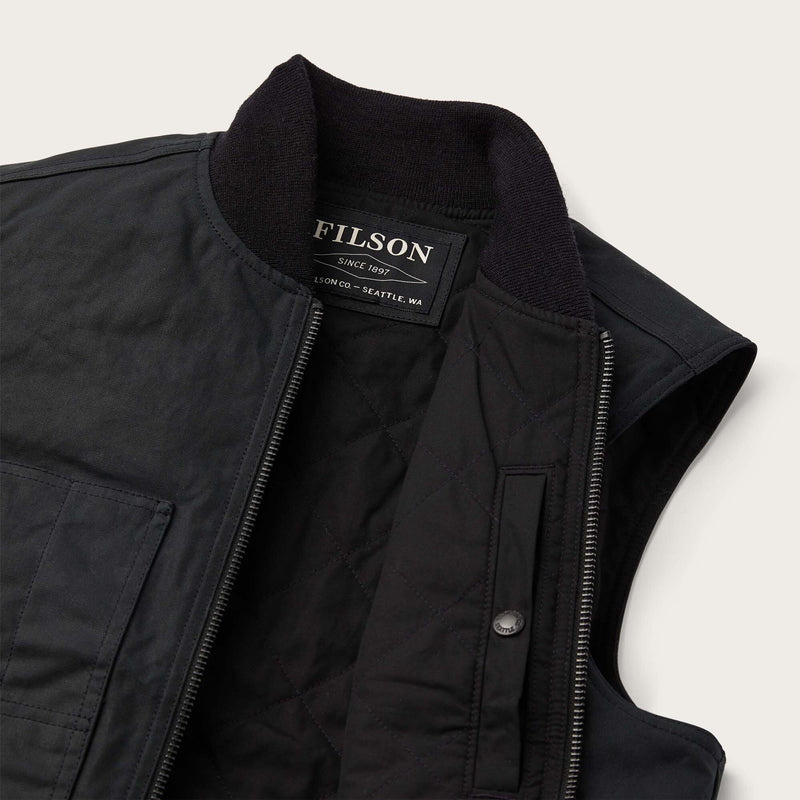 Tin cloth insulated work vest par Filson | Black (Black)