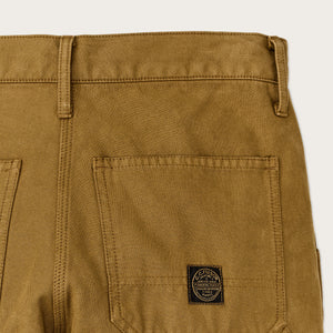 Women's field work pants di Filson | Dark ochre (Orange)